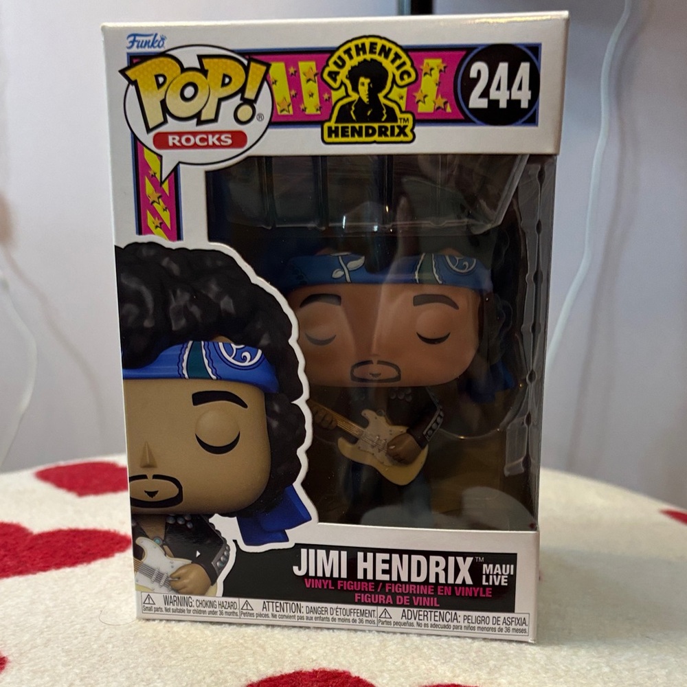Funko Pop Rocks Figure with Blue Bandana